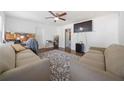 Inviting living room with modern decor, plush seating, hardwood floors, and plenty of natural light at 717 Chamberlain Sw Cir, Marietta, GA 30008