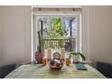 Bright breakfast nook with a view of the outside porch, perfect for morning coffee at 737 Barnett Ne St # C4, Atlanta, GA 30306