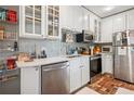 Well-maintained kitchen featuring stainless steel appliances and ample cabinet space at 737 Barnett Ne St # C4, Atlanta, GA 30306