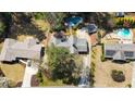 Aerial view of the property showing two swimming pools and surrounding landscaping at 53 Weatherstone Pkwy, Marietta, GA 30068