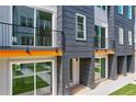 Close-up of modern townhome exterior, highlighting balconies, large windows, and sleek design elements at 2029 Memorial Dr # 32, Atlanta, GA 30317