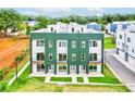 Aerial view of modern, green townhomes with balconies, showcasing contemporary design and community layout at 2029 Memorial Dr # 32, Atlanta, GA 30317