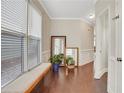 Inviting foyer featuring hardwood floors, natural light, and neutral decor at 5143 Micaela Way, Duluth, GA 30096
