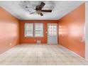 Bright living room offering tile floors and natural light at 126 Washington St, Mcdonough, GA 30253