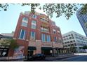 Low angle shot of a brick building in a commercial location on a sunny day at 265 18Th Nw St # 2329, Atlanta, GA 30363