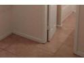 Tiled hallway, with a walk-in storage space at 3223 Strawberry Ln, Decatur, GA 30034