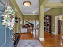 Inviting foyer showcases hardwood floors, stylish decor, and plenty of natural light at 4162 Crowder Nw Dr, Kennesaw, GA 30152