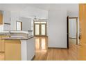 Inviting living area with gleaming hardwood floors and neutral paint throughout at 390 17Th Nw St # 4048, Atlanta, GA 30363