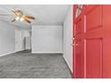 Inviting living room featuring freshly painted walls, and plush gray carpeting at 5904 Heatherwood Ln, Riverdale, GA 30296