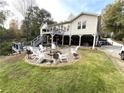 Inviting backyard featuring an outdoor fire pit with a seating area, perfect for entertaining at 4002 Wieuca Ne Rd, Atlanta, GA 30342