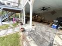 Covered patio area with stone floors and plenty of space for seating and entertaining at 4002 Wieuca Ne Rd, Atlanta, GA 30342