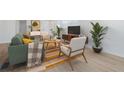 Inviting living room with modern decor, stylish furniture, and natural light at 794 Casplan St, Atlanta, GA 30310