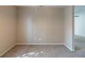 Neutral living room with carpeted floors, light-colored walls, and plenty of electrical outlets at 181 Bernice Dr, Lawrenceville, GA 30045