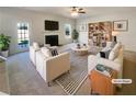 Bright, well-appointed living room featuring a fireplace, stylish furnishings, and large windows at 501 Fable Ln, Canton, GA 30114