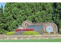 Barnes Mill entrance sign surrounded by beautiful landscaping, creating a welcoming ambiance for residents and visitors at 625 Aunt Lucy Ln # 45, Smyrna, GA 30082