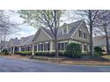 Charming townhome exterior showcasing manicured landscaping, classic architecture, and inviting curb appeal at 625 Aunt Lucy Ln # 45, Smyrna, GA 30082