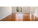 Bright room features hardwood floors and large windows at 3707 Mcguire Nw St, Kennesaw, GA 30144