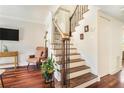 Inviting entryway with hardwood floors, elegant staircase, and neutral decor at 377 Ralph Mcgill Ne Blvd # H, Atlanta, GA 30312