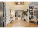 Inviting foyer with gleaming hardwood floors and a view to the open floor plan at 788 Old Paper Mill Dr, Marietta, GA 30067
