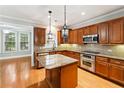 Spacious kitchen featuring an island and modern stainless steel appliances at 3317 Regent Sw Pl, Atlanta, GA 30311