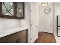 Kitchen area with hardwood floors adjacent to the foyer at 850 Piedmont Ne Ave # 1206, Atlanta, GA 30308