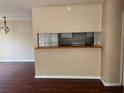 Kitchen view showcasing a breakfast bar that connects the space to the living room at 1315 Old Coach Sw Rd, Marietta, GA 30008