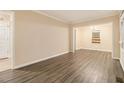 Spacious living room featuring stylish wood-look flooring and open layout at 1907 Oak Valley Rd, Decatur, GA 30035