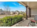 Inviting front porch with comfortable seating and scenic neighborhood views at 359 Woodridge Pass, Canton, GA 30114