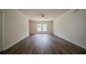Spacious living room with hardwood floors, ceiling fan, and natural light at 2899 Duncan Pl, Decatur, GA 30034