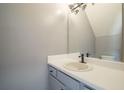 Neutral bathroom with white countertop sink and vanity at 74 Venture Path, Hiram, GA 30141