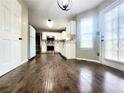 Spacious kitchen featuring stainless steel appliances and hardwood floors at 1535 Wilkes Crest Dr, Dacula, GA 30019