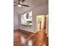 Open living space showcasing hardwood floors and a view to the modern kitchen at 2089 Lenox Rd, Atlanta, GA 30324