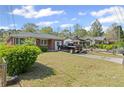 Quaint one-story home with mature landscaping and a long driveway, blending suburban charm at 131 Brownlee Rd, Atlanta, GA 30331