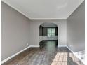 Bright living room featuring hardwood floors, neutral walls, and arched entryway at 4551-0 Howell Farms Nw Rd, Acworth, GA 30101