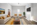Bright living room featuring modern furnishings, fireplace, and stylish decor at 510 James P. Brawley Dr. Nw Dr, Atlanta, GA 30318