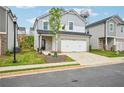 A delightful two-story home with an attached garage and a well-maintained lawn at 2770 Aralynn Way, College Park, GA 30337