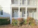 Charming condo entryway with tidy front garden and fresh exterior paint at 35 Rumson Se Ct, Smyrna, GA 30080