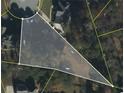Aerial view shows the boundaries of the property with its respective dimensions at 740 Trillium Ln, Lilburn, GA 30047