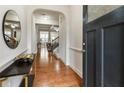 Elegant foyer with hardwood floors and an open view into the living space, creating an inviting first impression at 5016 Whiteoak Se Pointe, Smyrna, GA 30080