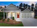 Charming single-story home with inviting porch and a two-car garage at 7 Hickory Branch, Hiram, GA 30141