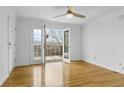 Living room with access to a balcony overlooking the neighborhood at 869 Briarcliff Ne Rd # B11, Atlanta, GA 30306