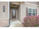 Inviting front entrance with well-maintained landscaping and a Ring doorbell at 228 Dorothy Ln, Lawrenceville, GA 30046
