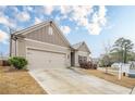 A single Gathering home with a two-car garage and long driveway at 228 Dorothy Ln, Lawrenceville, GA 30046