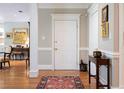 Inviting entryway with hardwood floors, detailed trim, and charming decor, creating a warm welcome at , Atlanta, GA 30305
