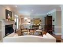 Cozy living room with a fireplace, elegant furnishings, and a built-in bar for entertaining at , Atlanta, GA 30305