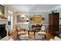 Comfortable living room featuring a fireplace, refined decor, and a wet bar perfect for relaxing at , Atlanta, GA 30305