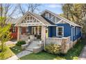 Quaint craftsman home with blue brick, stone accents, and a cozy front porch at 1514 Rogers Sw Ave, Atlanta, GA 30310