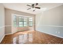 Bright dining room with bay windows and tile flooring at 714 Post Road Dr, Stone Mountain, GA 30088