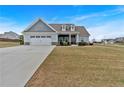 Inviting single-Gathering home with a spacious front yard, two-car garage, and well-maintained lawn at 95 Summerlyn Dr, Hiram, GA 30141