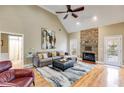 Spacious living room with hardwood floors, stone fireplace and neutral tones at 1409 Northgate Dr, Villa Rica, GA 30180